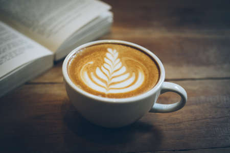 how to make latte art coffee in vintage colorの写真素材