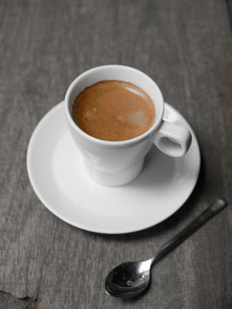 cup of coffee latte on the wood texture