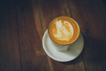 coffee latte art in cofeee sbop vintage color toneの写真素材