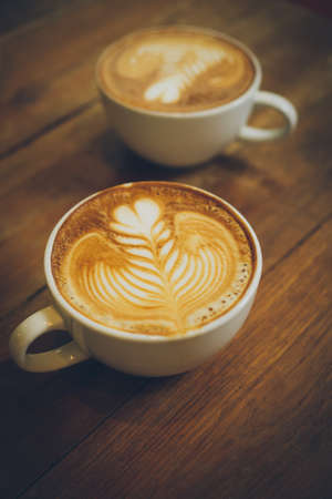 coffee latte art in cofeee sbop vintage color toneの写真素材