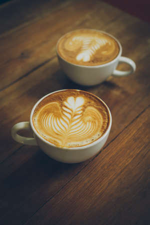 coffee latte art in cofeee sbop vintage color toneの写真素材