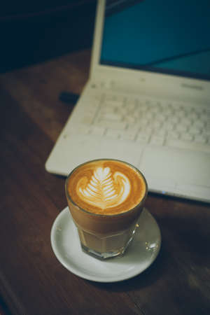 coffee latte art in cofeee sbop vintage color toneの写真素材