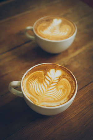 coffee latte art in cofeee sbop vintage color toneの写真素材