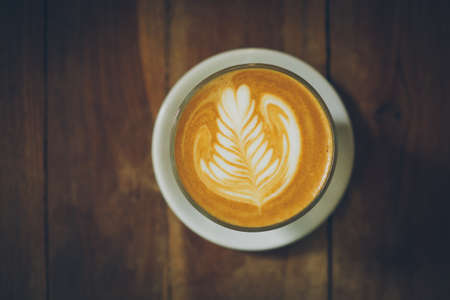 coffee latte art in cofeee sbop vintage color toneの写真素材