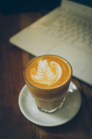 coffee latte art in cofeee sbop vintage color toneの写真素材