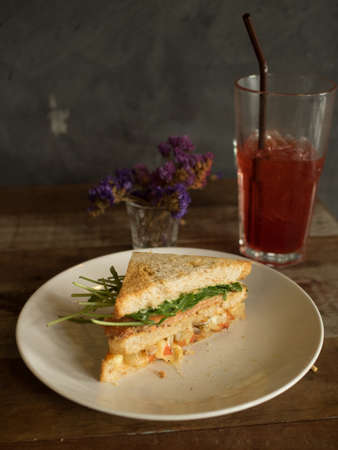 Homemade Sandwich with salmon, Tomato, and Onionの写真素材