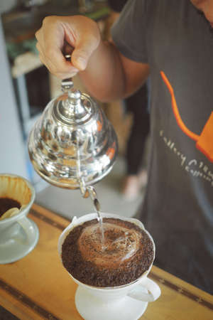 coffee dripping in coffee shop vintage color toneの写真素材