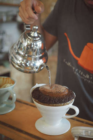 coffee dripping in coffee shop vintage color toneの写真素材
