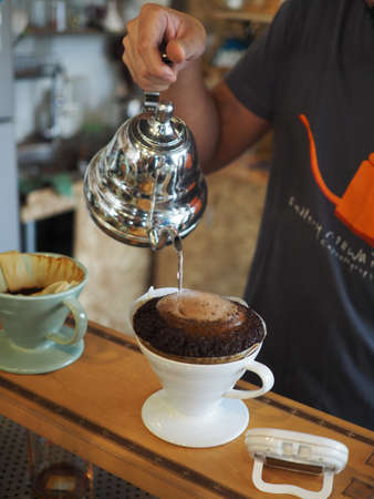 coffee dripping in coffee shop vintage color toneの写真素材