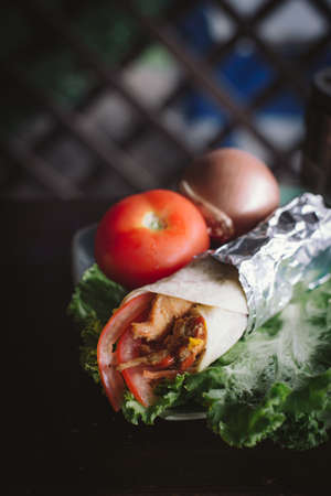 Kebab - grilled meat, bread and vegetablesの写真素材