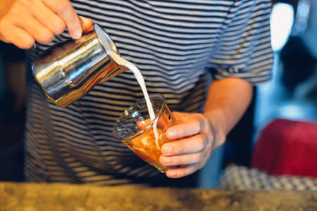 how to make coffee latte art in vintage color toneの写真素材