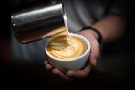 how to make coffee latte in vintage color toneの写真素材