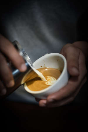 how to make coffee latte in vintage color toneの写真素材