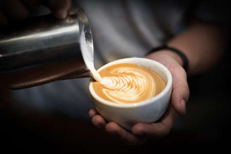 how to make coffee latte in vintage color toneの写真素材
