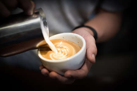 how to make coffee latte in vintage color toneの写真素材