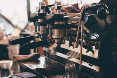 close up barista hand making a cup of coffee.の写真素材