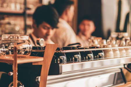 close up barista hand making a cup of coffee.の写真素材