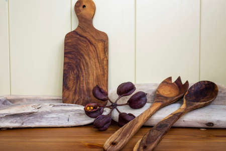 Wooden board and spoon made of olive tree wood.の写真素材