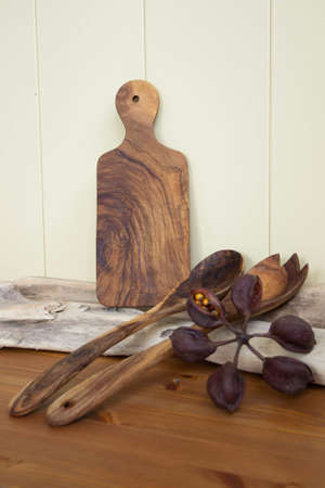 Wooden board and spoons made of olive tree wood.の写真素材