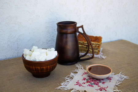 Homemade cottage cheese honey pie, a jug of milk. Healthy eating. Breakfastの写真素材