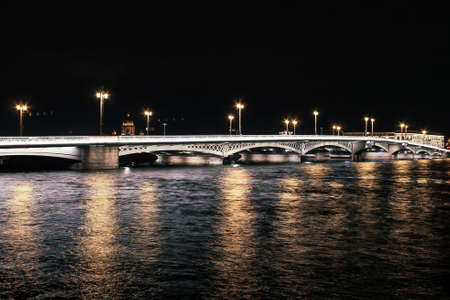Palace Bridge over the Neva river at night.の写真素材