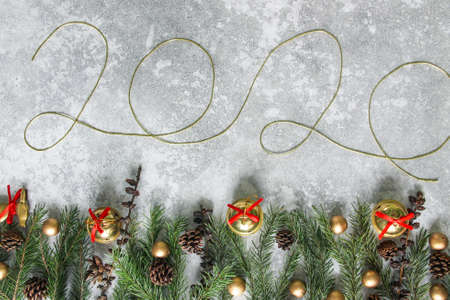 Christmas background from natural branches of spruce. New Year 2020.