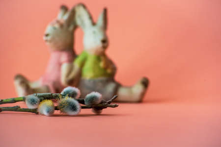 Pussy willow twigs and two easter bunnies.の写真素材
