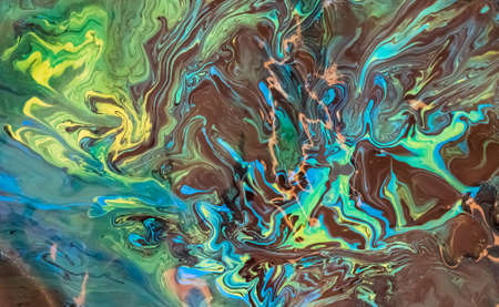 Fluid Art. Abstract colorful background, wallpaper. Mixing paints.