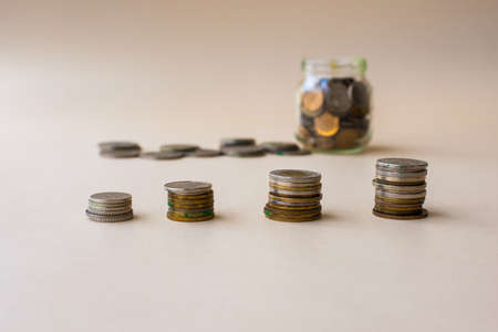 Coins pile. Concept of saving money in a crisis.の写真素材