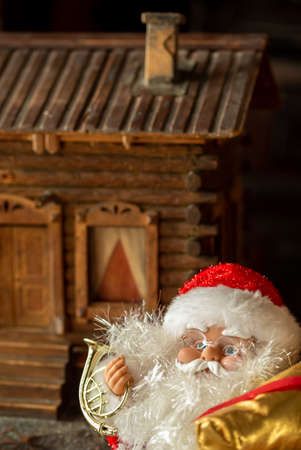 Toy Santa Claus with a bag of Christmas giftsの写真素材
