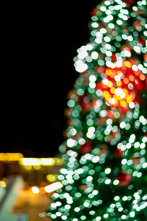 Bokeh abstract background, Christmas tree with decorationsの写真素材