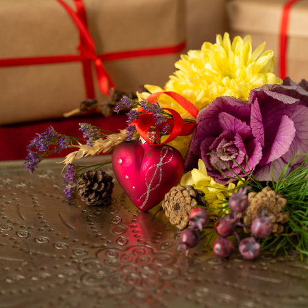Christmas composition with bouquet and gift boxes.の写真素材