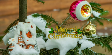 Decorative house-candlestick on the Christmas tree.の写真素材