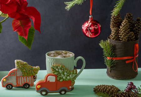 Iced tea, New Years gingerbread, spruce branches and cones.の写真素材