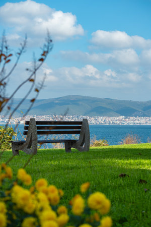 Bench by the sea in Nessebar overlooking St. Vlas, Bulgaria.の写真素材