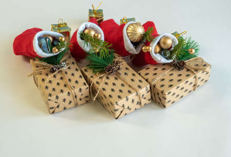 New Years gifts - boxes and red stockings on a white background