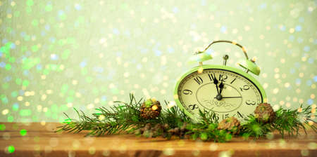 Christmas background with snow and clock face.
