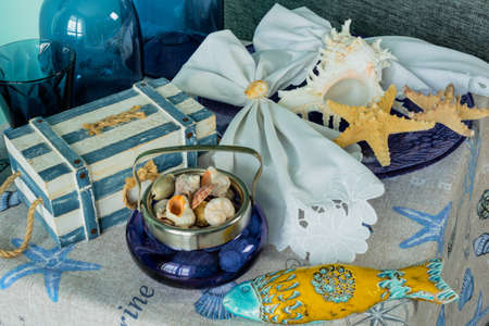 Marine style in the interior, table setting in a sea styleの写真素材