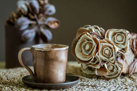 Flowers from natural materials. Beige-brown tones. The concept of natural materials and nature conservationの写真素材