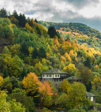Old traditional Bulgarian house in mountain village of Kovachevitsa. Traditional slan stone roofsの写真素材