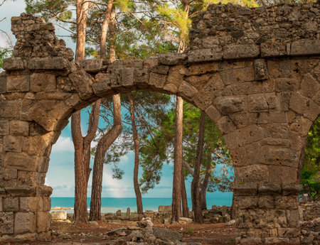 Ruins of aquaeduct in ancient city Phaselis, Antalya Province, Turkey. Lycian ancient civilization heritage.の写真素材