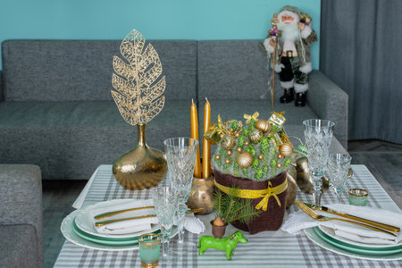 New Years festive table setting, cutlery, decorations, New Years decor, Christmas servingの写真素材