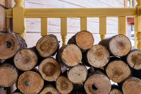 Stock of firewood for heating the house. The trees were cut down and split into firewoodの写真素材
