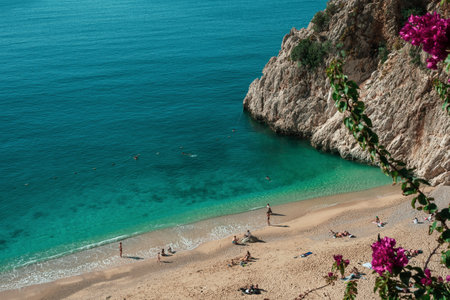 Beautiful Kaputas beach with bougainvillea flowers in the background. December. Turkey Antalya Kemer