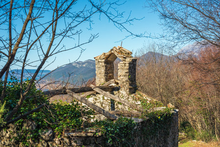 Old ruined orthodox church in montenegro near Tivat on a tourist mountain trailの写真素材