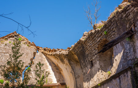 Abandoned old catholic church, damaged by the earthquake in 1979 in the town of Prcanj Montenegroの写真素材