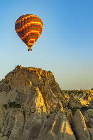 Hot air balloons flying over the valley at Cappadocia, Turkey.の写真素材