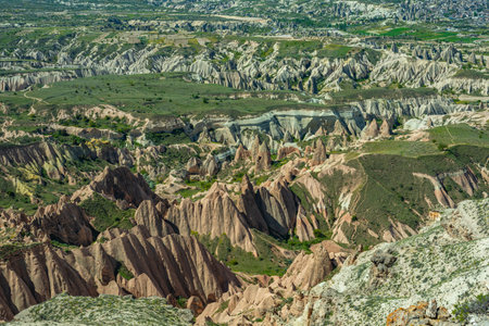 Panoramic view of Goreme national park with over deep canyons, valleys sunset Cappadocia.の写真素材