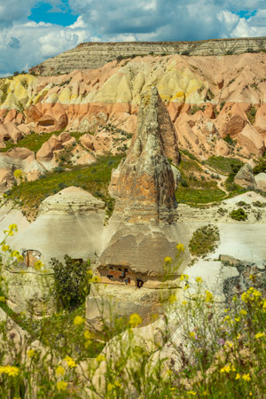 Martian landscape in Cappadocia, unique relief of mountains painted in yellow and pink colorsの写真素材