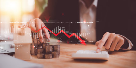 concept of interest rates and dividends ,Interest rate decline graph ,Financial interest rates ,economic recession ,stock market ,finance and investment ,percentage increase in debt ,interest burdenの写真素材